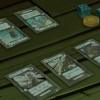 Des gardes sadidas jouent au jeu de cartes Wakfu TCG