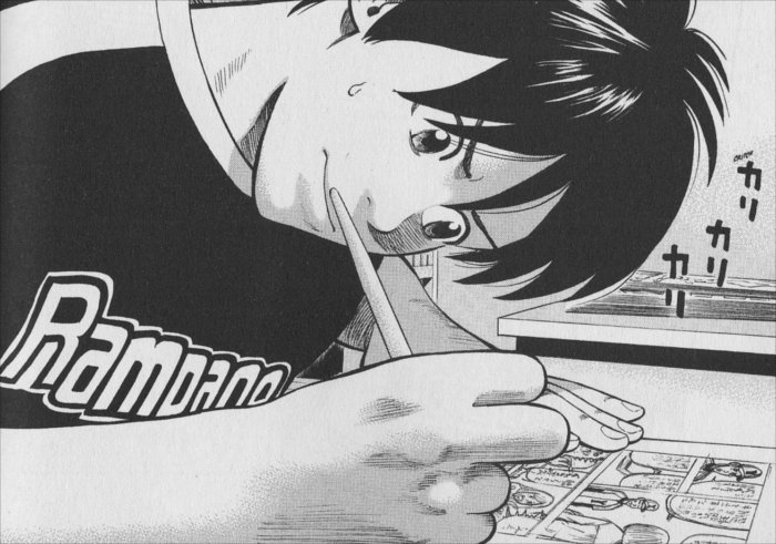Fushimi au travail sur son dernier manga