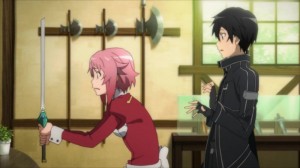 Lisbeth face à l'épée cassée par Kirito pour tester la solidité de l'arme