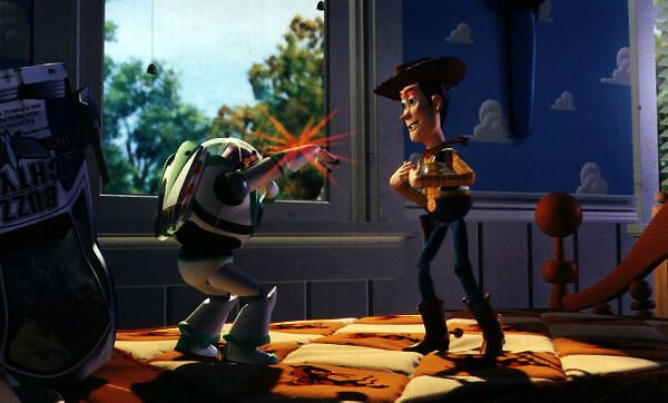 Buzz tente d'impressionner Woody avec son lazer