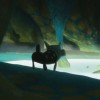 Noximilien découvre l'Eliacube flottant dans l'étang de la grotte