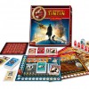 Contenu du jeu de société Les Aventures de Tintin avec les 3 plateaux et les cartes