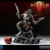 Figurine Diablo 3 Overthrown Barbare : comparaison avec une pomme