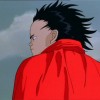 Tetsuo pensif alors qu'il va vers le stade où est caché Akira