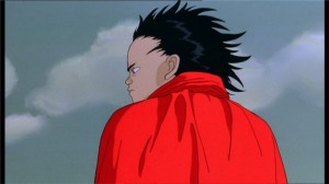 Tetsuo pensif alors qu'il va vers le stade où est caché Akira